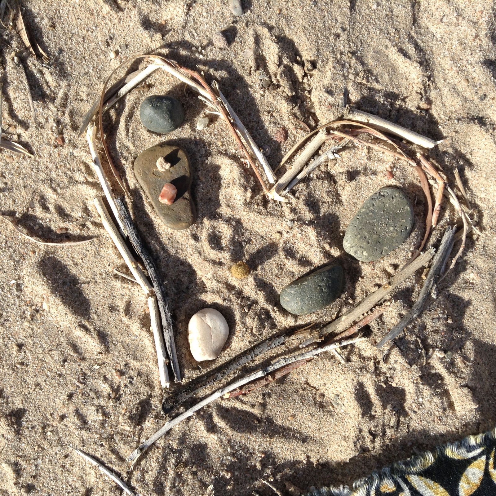 Heart made of sticks and stones